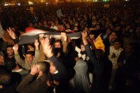 Protesters holding the Egyptian flag.