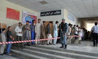 Voters queuing up in front of a polling center.